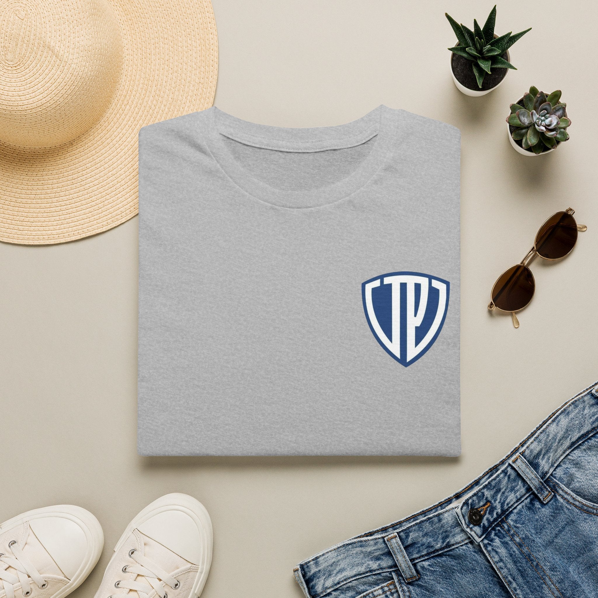 Shield Crest Pocket Tee — Retro Badge Logo T‑Shirt