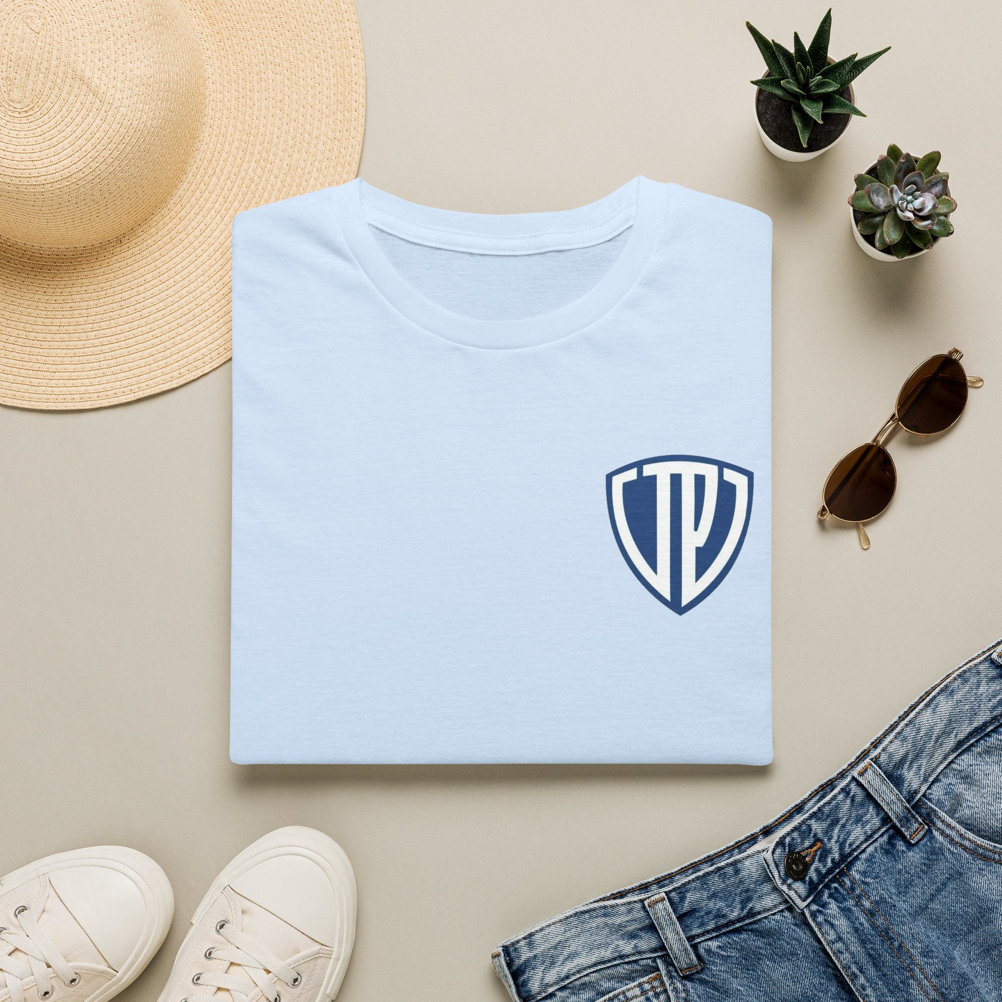 Shield Crest Pocket Tee — Retro Badge Logo T‑Shirt